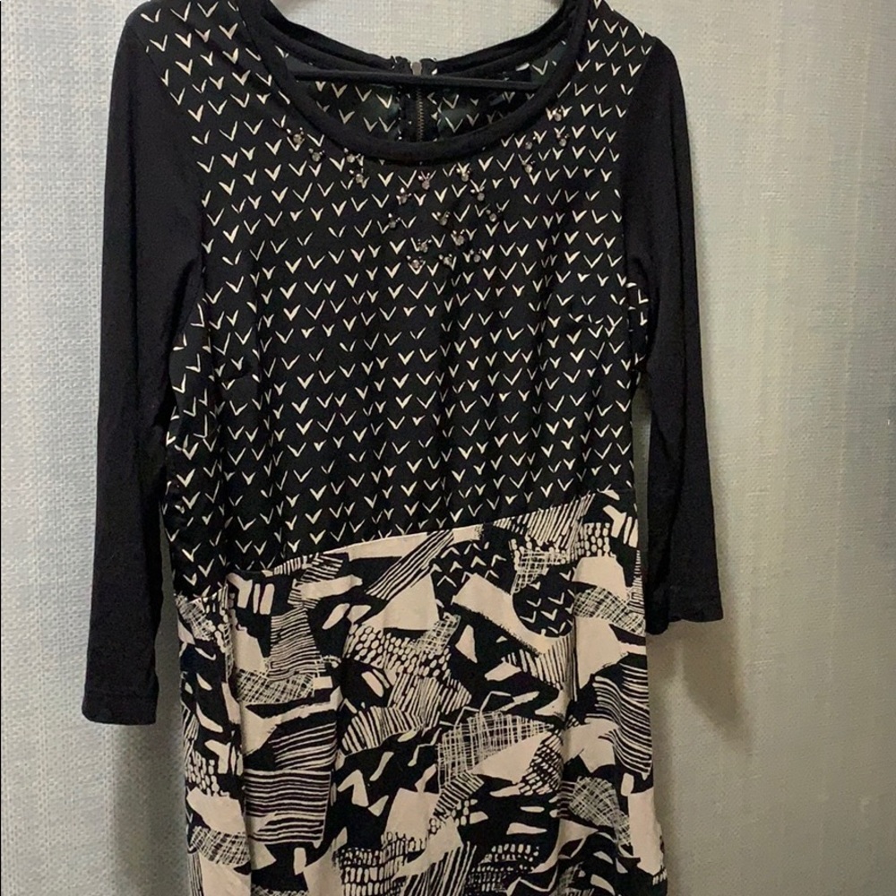 Next top, zipper on the back